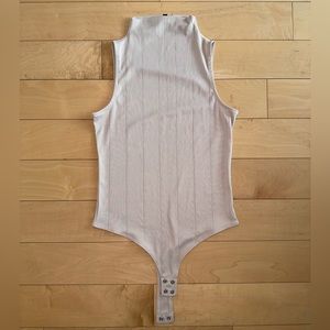 Dynamite mock neck bodysuit